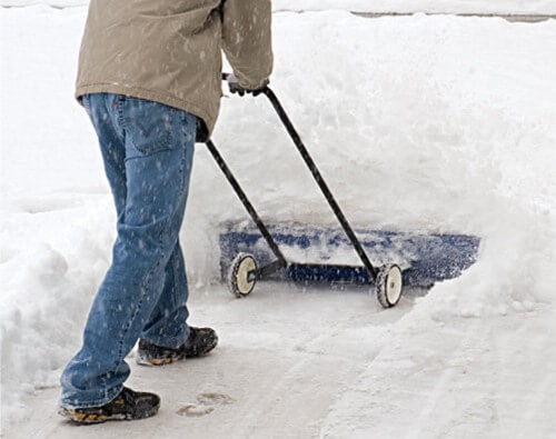 Person shoveling snow