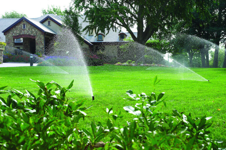 Residential sprinklers watering the lawn